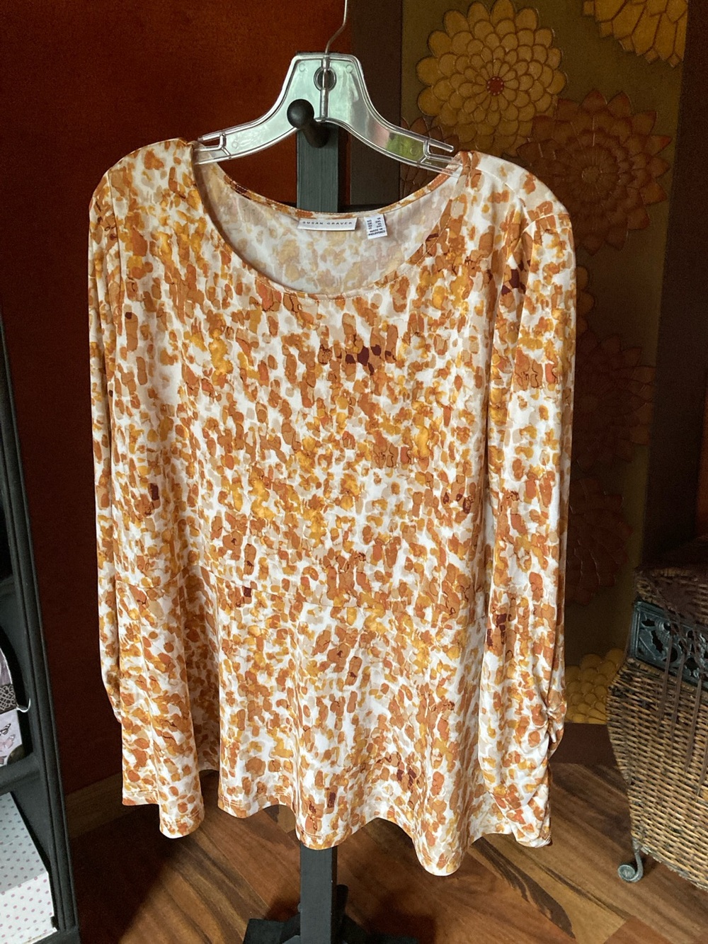 Susan Graver 1X long sleeved copper splash pattern peplum top